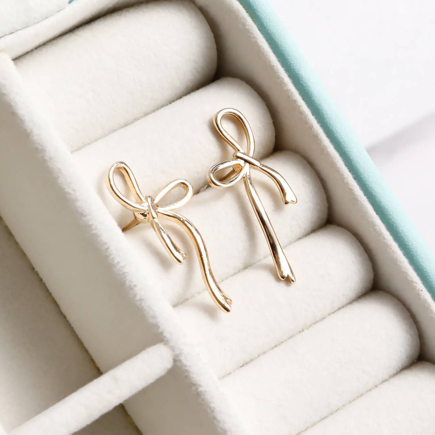 Gold bow earrings