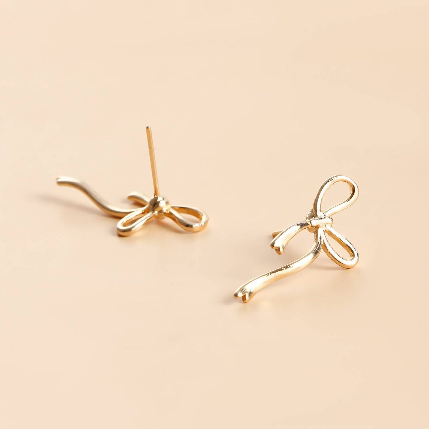 Gold bow earrings